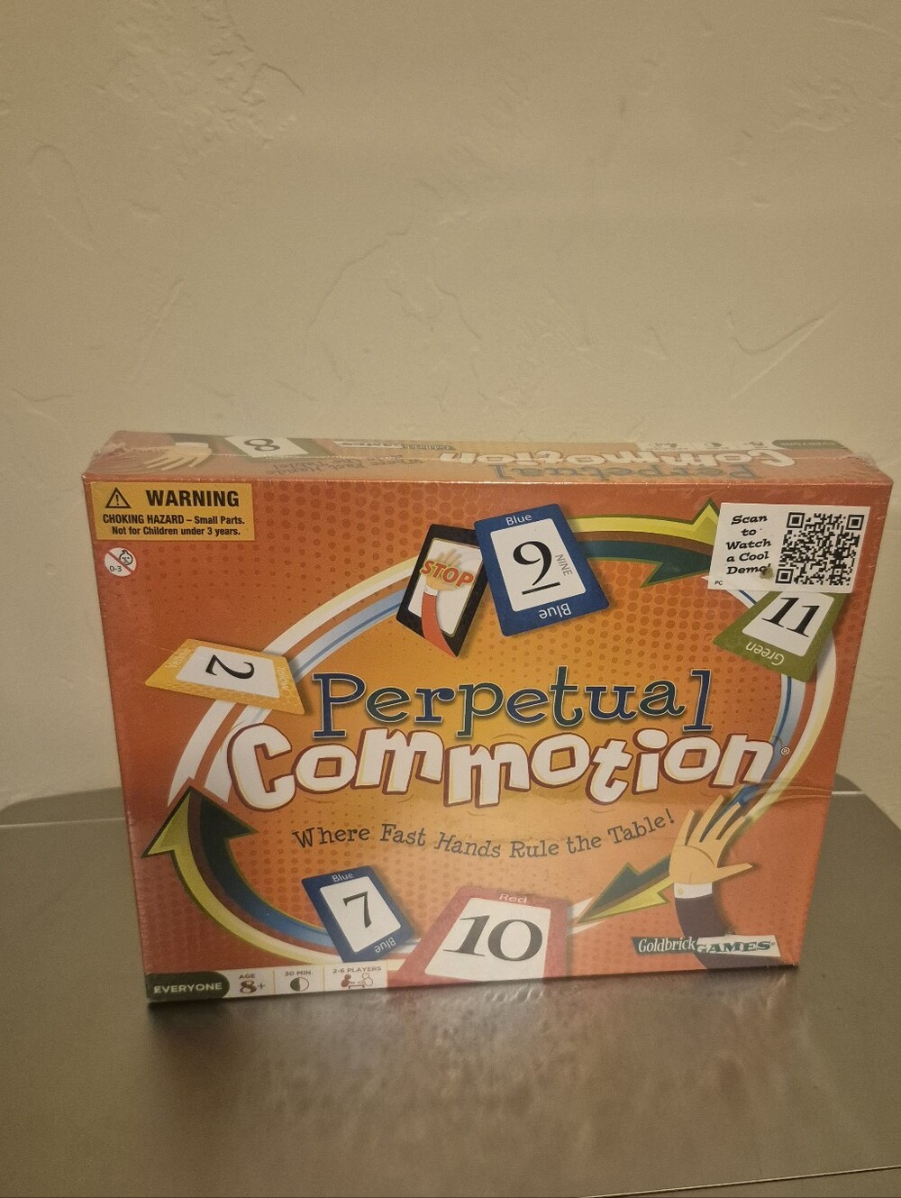 New Perpetual Commotion Card Game - Orange Box